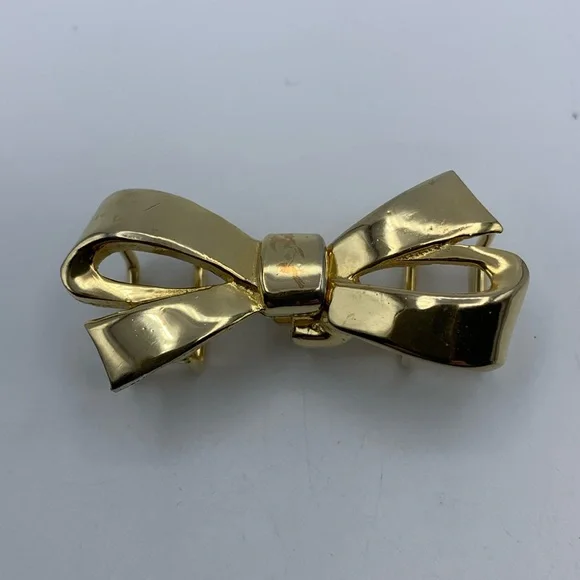 Sculptural 1979 Mimi Di N Signed Bow belt buckles